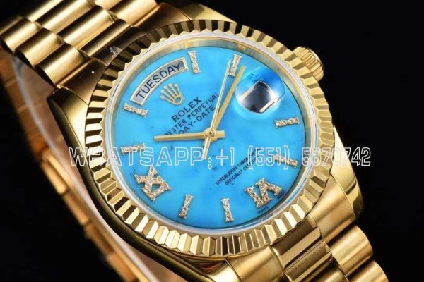 Rolex Day-Date 36 128238 Turquoise Diamond Roman Dial in Yellow Gold