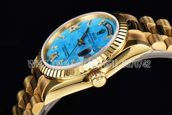 Rolex Day-Date 36 128238 Turquoise Diamond Roman Dial in Yellow Gold