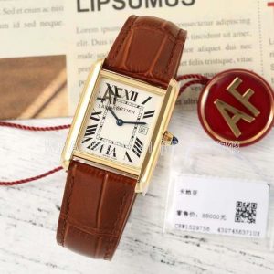 Cartier Tank Must Large 33.7mm Yellow Gold on Red leather watch strap White Dial